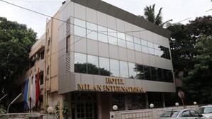 A modern building with the sign "HOTEL MILAN INTERNATIONAL" indicating it is a hotel. - Hotel Milan International (Mumbai)