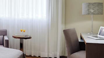 Pillow-top beds, minibar, in-room safe, desk