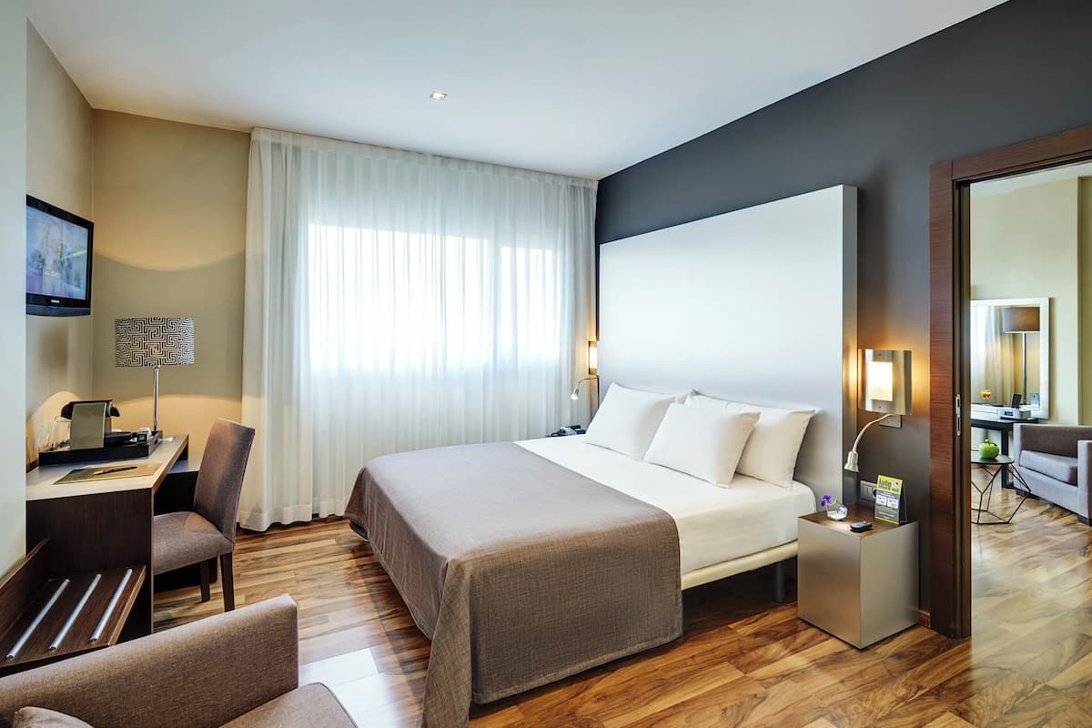 junior suite | pillow-top beds, minibar, in-room safe, desk