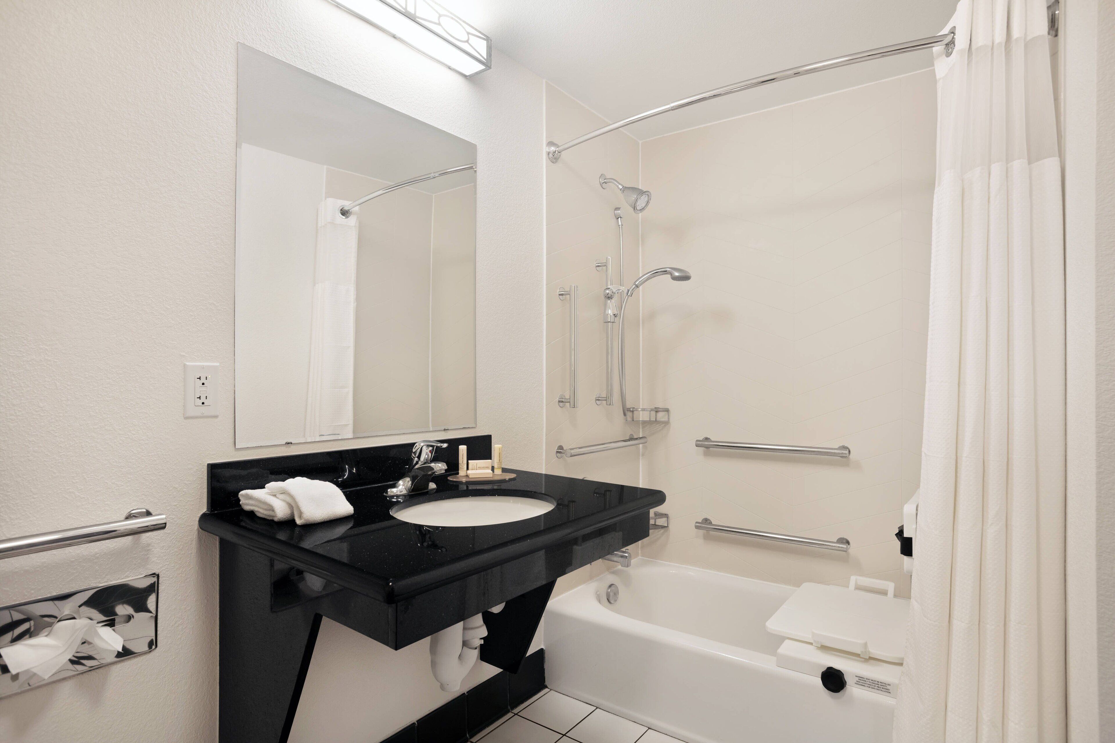 combined shower/bathtub, free toiletries, hair dryer, towels