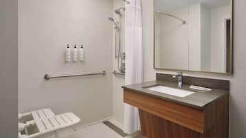 Habitación, 1 cama King size (Mobility/Hearing Access, Roll-in Shwr) | Baño | Tina con regadera, amenidades de baño gratuitas, secadora de cabello