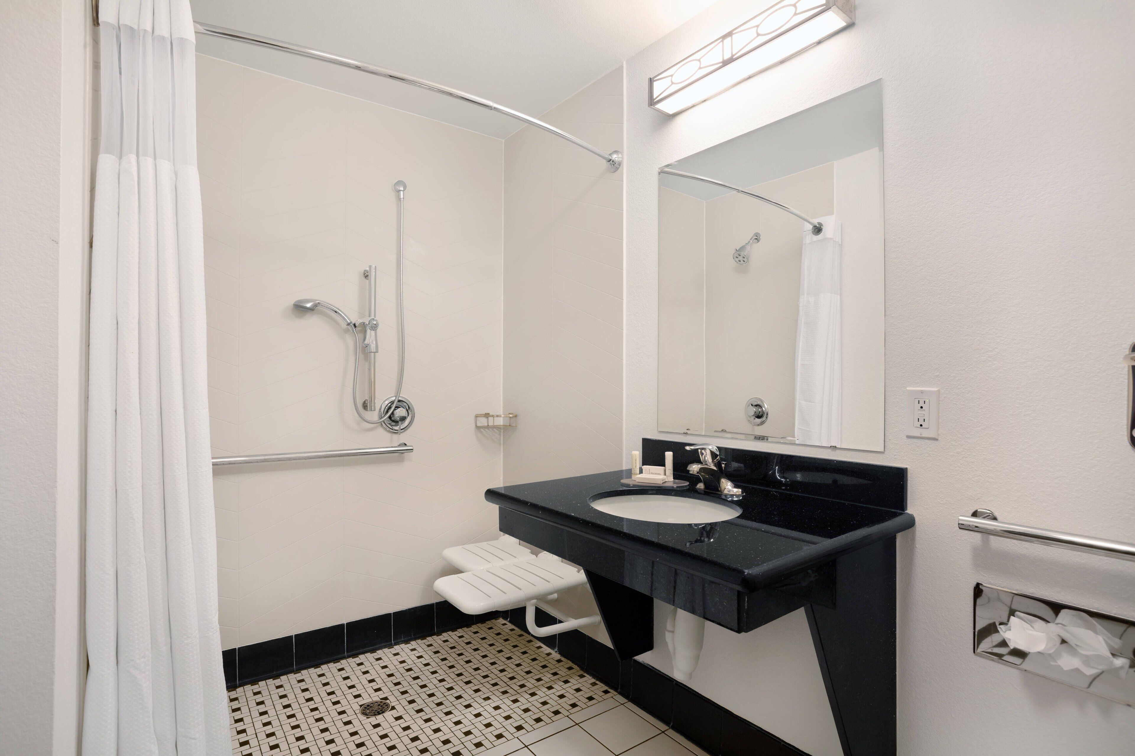 combined shower/bathtub, free toiletries, hair dryer, towels