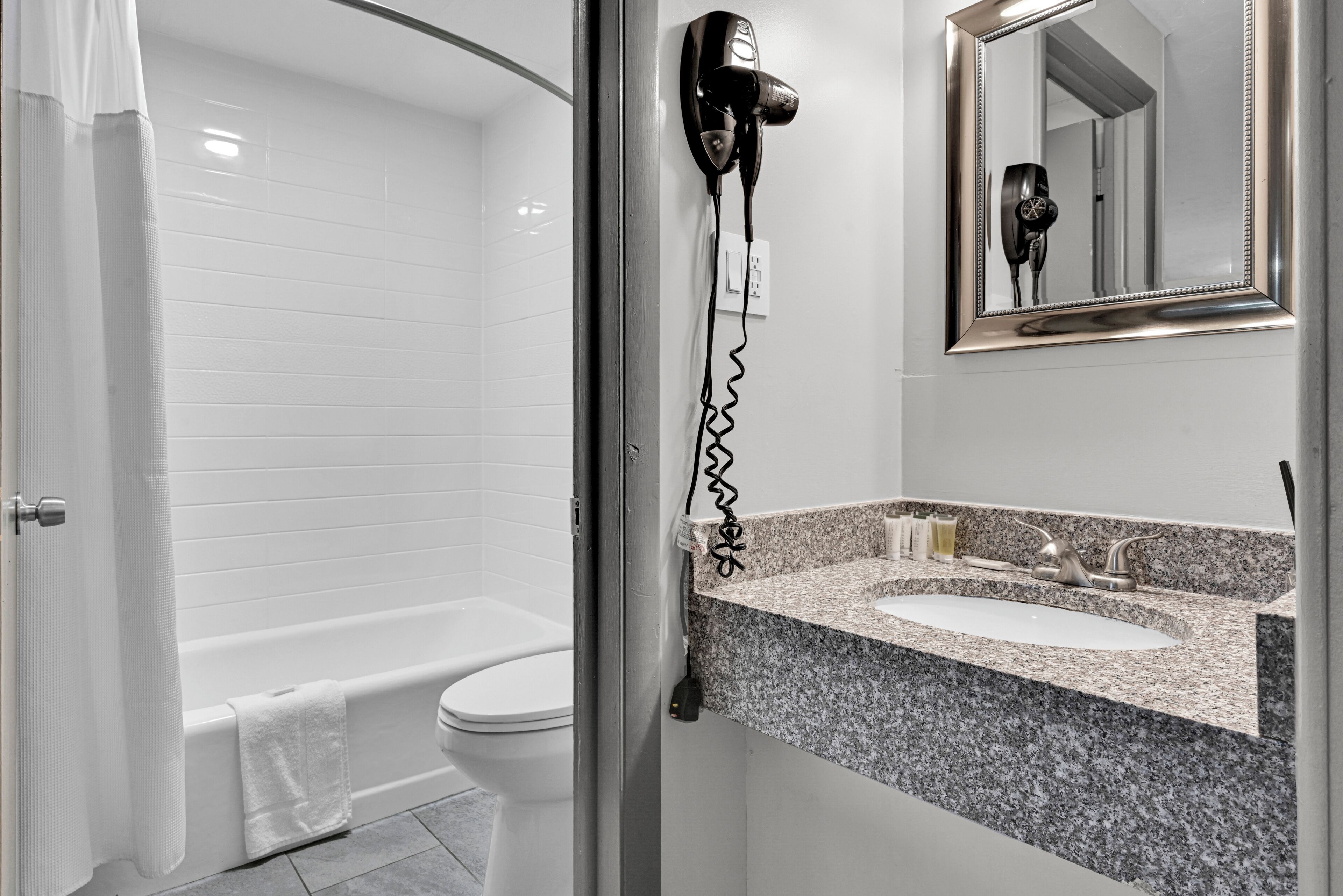 Room, 2 Double Beds, Non Smoking | Bathroom | Combined shower/tub, free toiletries, hair dryer, towels