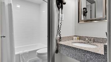 Room, 2 Double Beds, Non Smoking | Bathroom | Combined shower/tub, free toiletries, hair dryer, towels