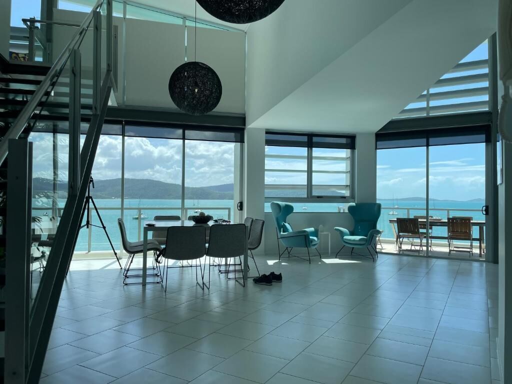 3 Bed 3 Bath Executive Deluxe Penthouse Apartment | Living area | Flat-screen TV, DVD player