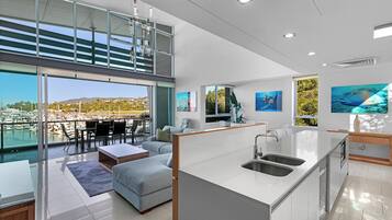 3 Bedroom 2 Bathroom Waterfront Penthouse | Living area | Flat-screen TV, DVD player