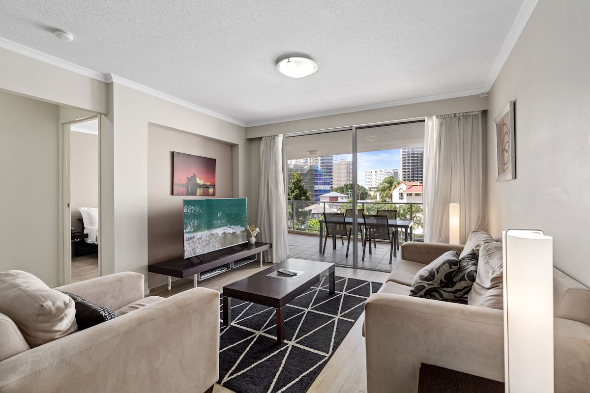 1 Bedroom 1 Bathroom Apartment | Living area | Flat-screen TV, DVD player