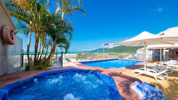 2 outdoor pools, open 7:00 AM to 9:00 PM, pool umbrellas, pool loungers