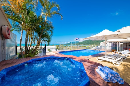 2 outdoor pools, open 7:00 AM to 9:00 PM, pool umbrellas, sun loungers