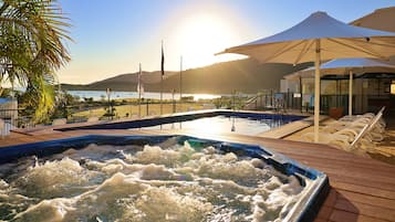 2 outdoor pools, open 7:00 AM to 9:00 PM, pool umbrellas, pool loungers