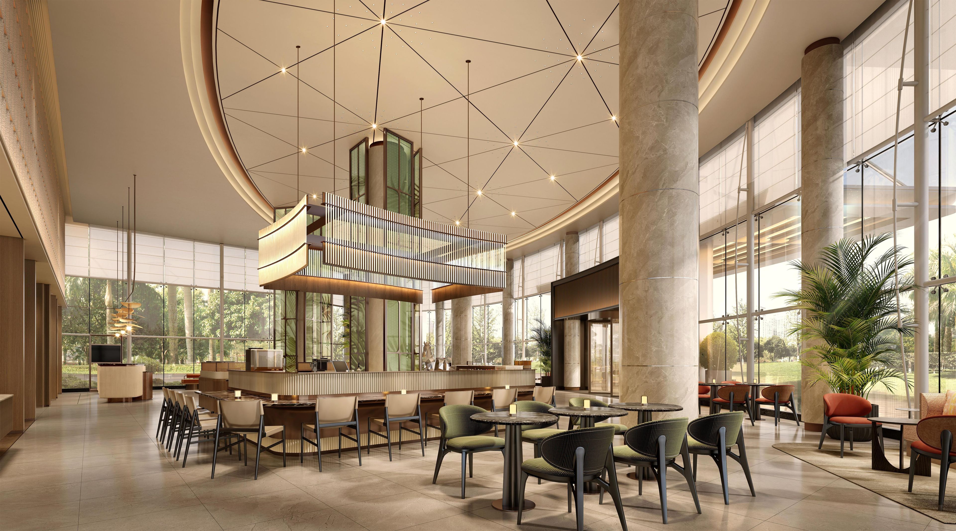 A spacious indoor area with high ceilings, large windows, and a central seating area with tables and chairs.