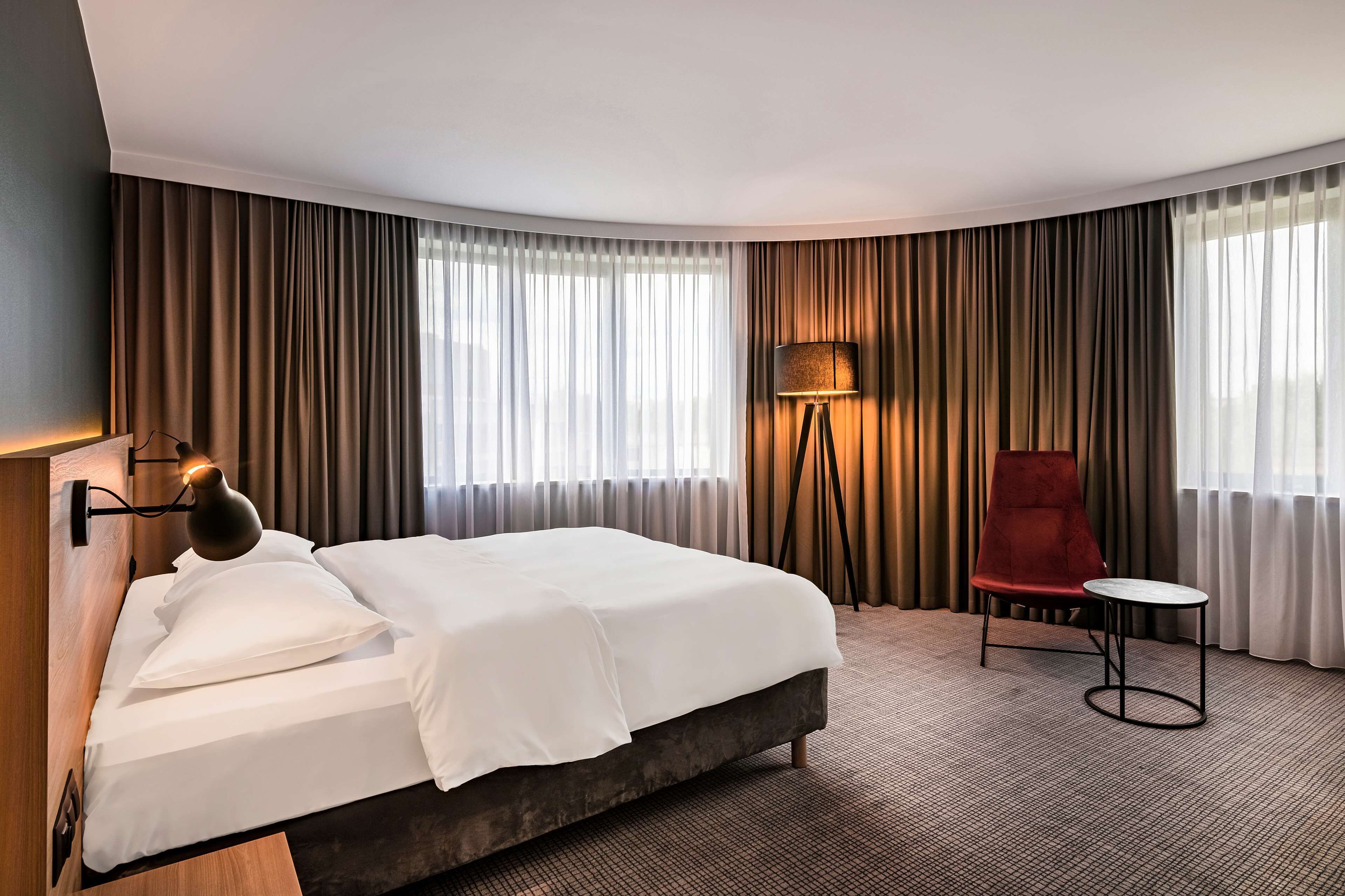 junior suite | in-room safe, desk, laptop workspace, blackout curtains