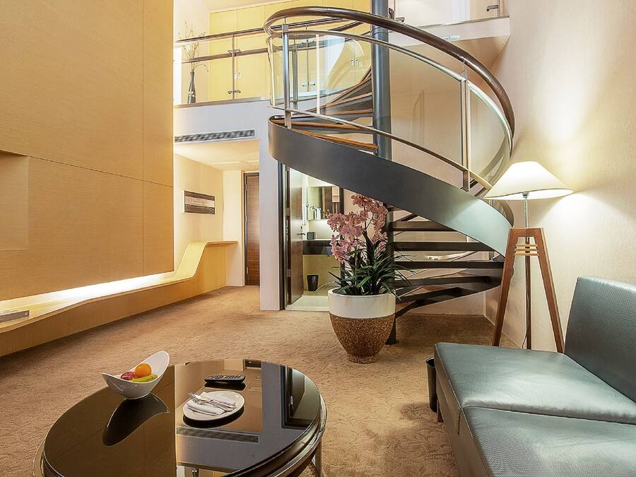 Luxury Triple Room, Mezzanine | Living area | 42-inch LCD TV with satellite channels, TV