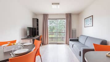 Superior Apartment, 1 Bedroom | Living area | Flat-screen TV