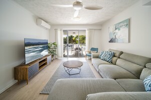 Executive Apartment, 3 Bedrooms | Living area | 42-inch flat-screen TV with cable channels, TV, DVD player