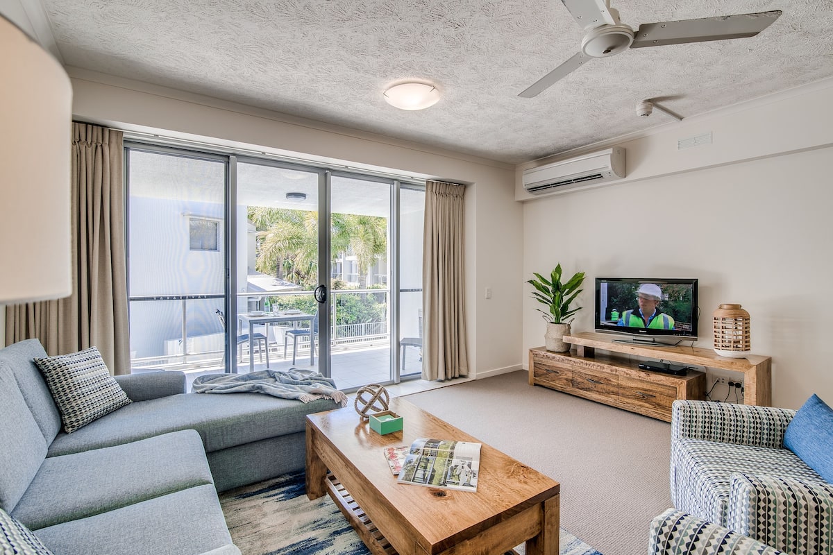 One Bedroom Apartment | Living room | 42-inch flat-screen TV with cable channels, TV, DVD player