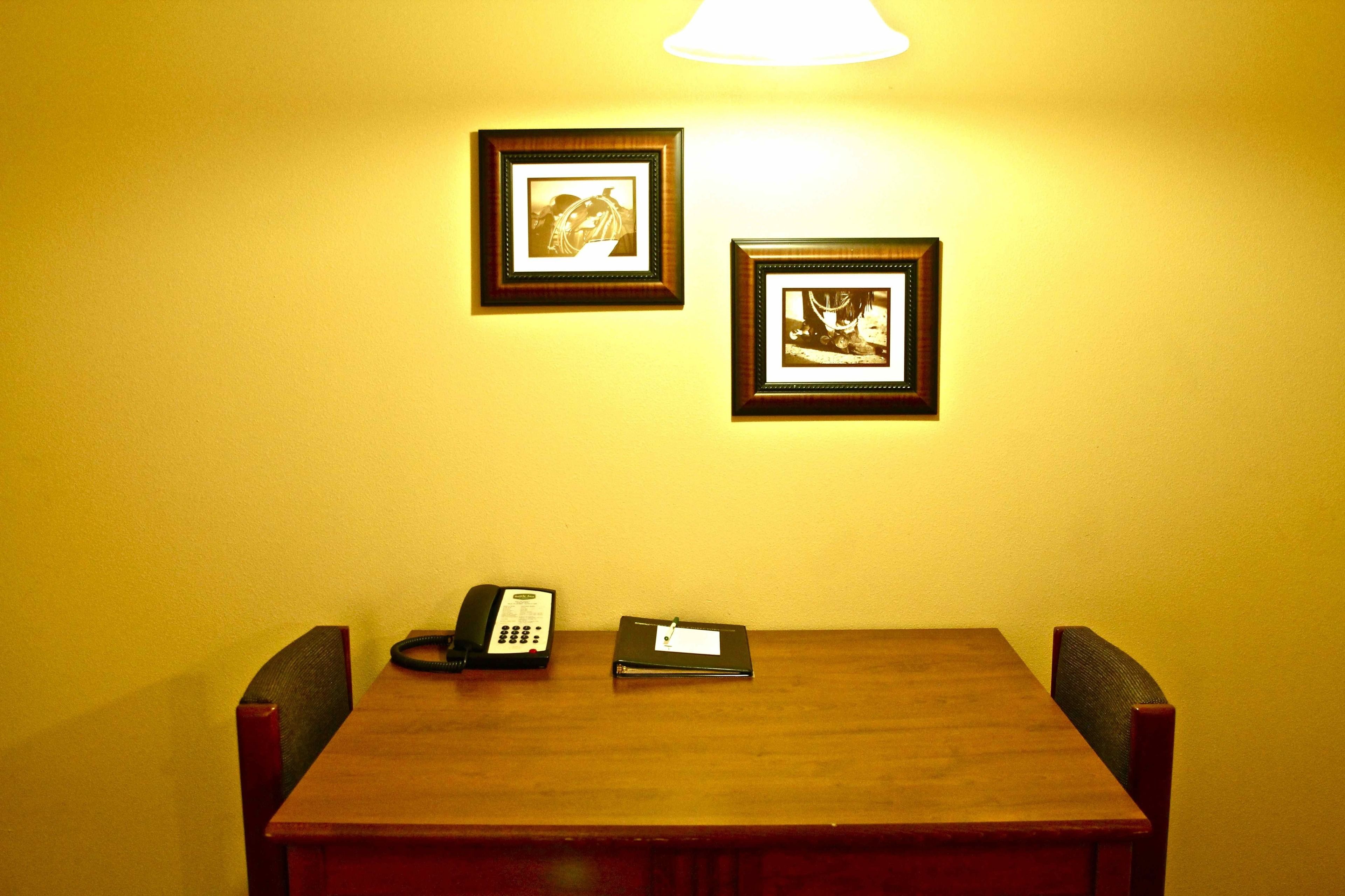 premium bedding, pillow-top beds, desk, blackout curtains