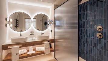 Eco-friendly toiletries, hair dryer, bidet, towels