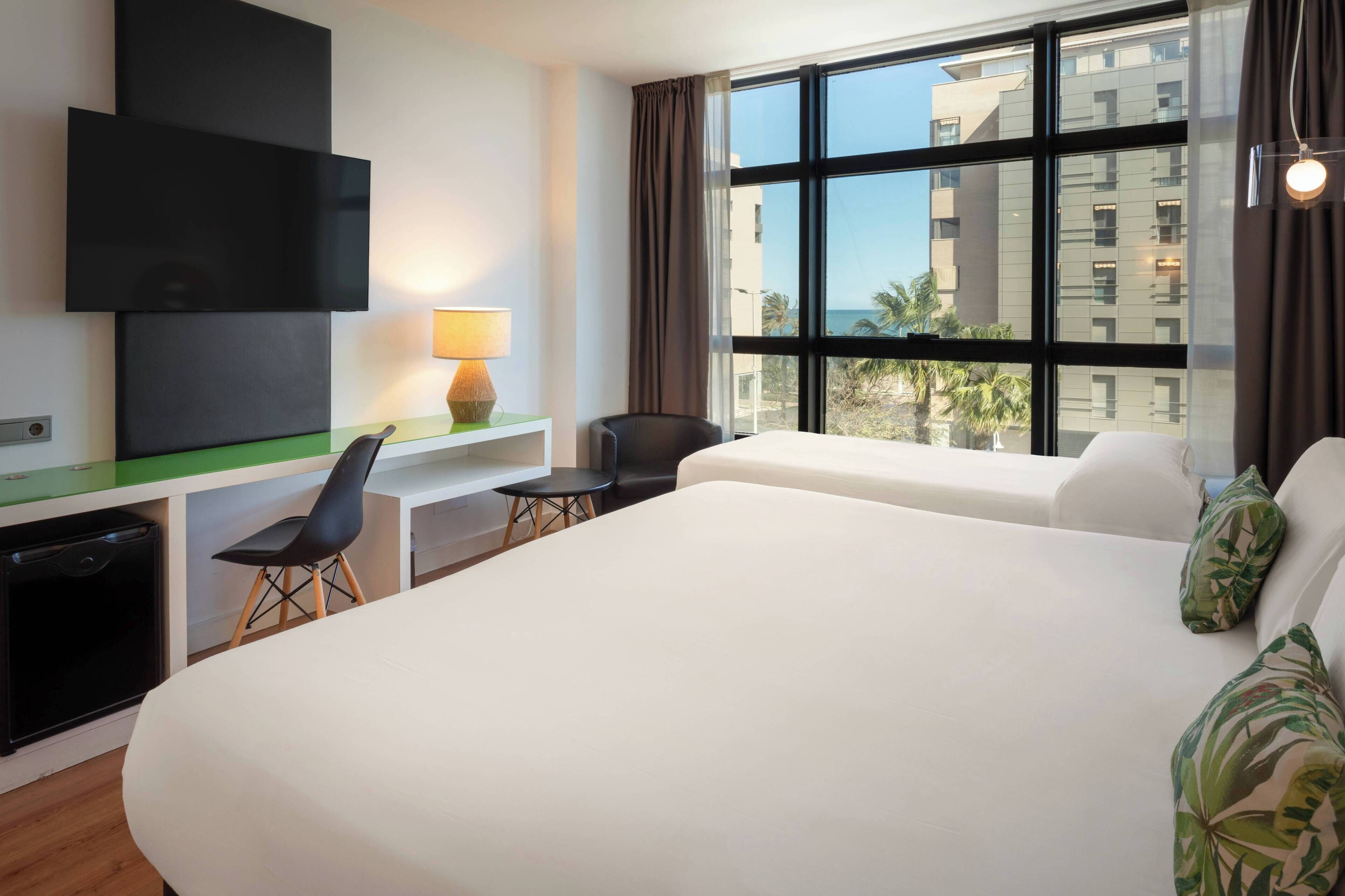 premium bedding, down duvets, minibar, in-room safe