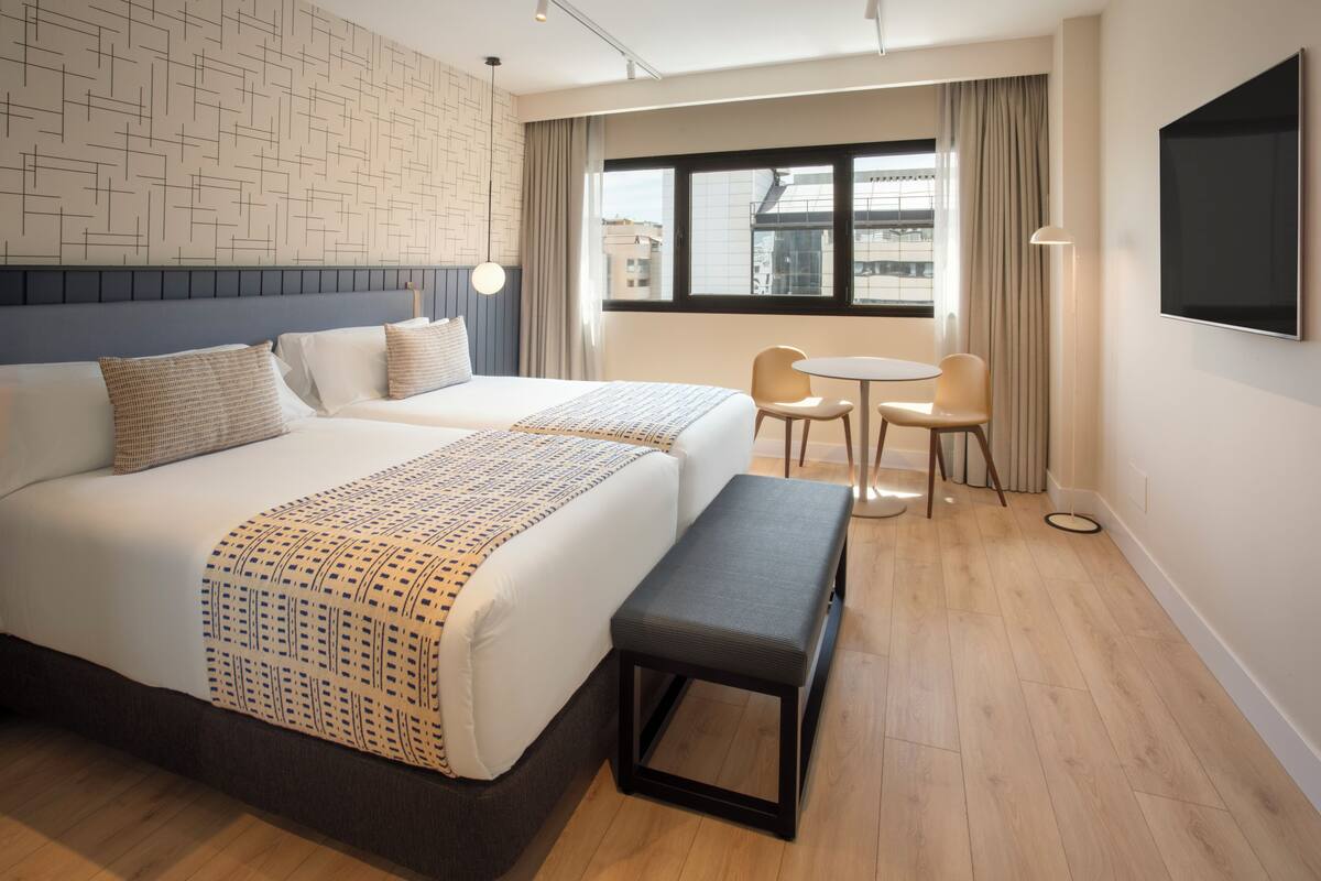 Premium bedding, down comforters, minibar, in-room safe