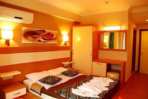 Habitación estándar | Minibar, cunas gratuitas y ropa de cama 