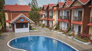 Outdoor pool, open 7:00 AM to 7:30 PM, pool umbrellas, sun loungers