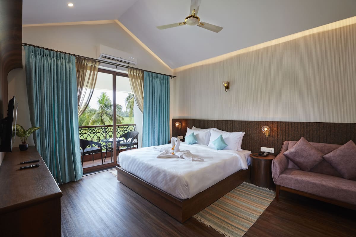 Phòng Cao cấp, 1 giường cỡ king, quang cảnh vườn | Bộ đồ giường cao cấp, minibar, két bảo mật tại phòng 