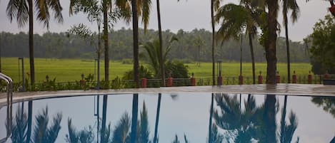 Outdoor pool, open 7:00 AM to 7:30 PM, pool umbrellas, sun loungers