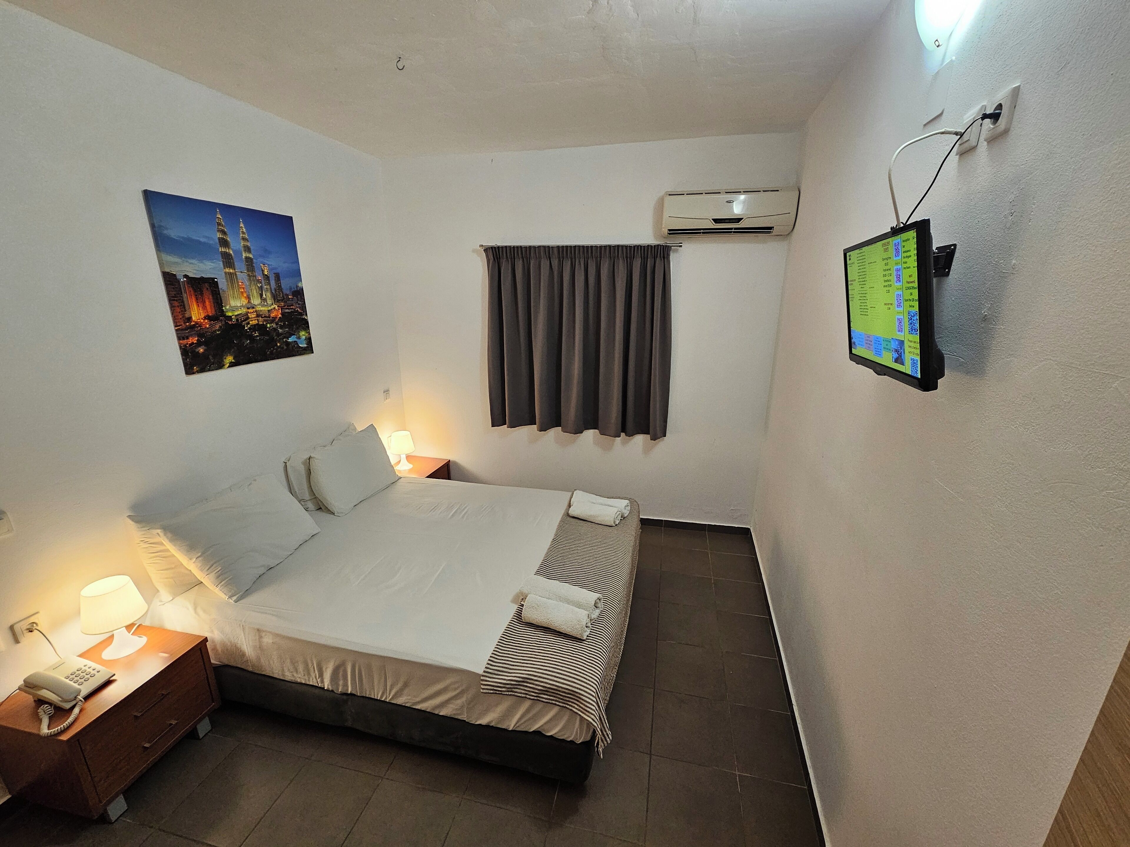 Coffres-forts dans les chambres, Wi-Fi gratuit, draps fournis