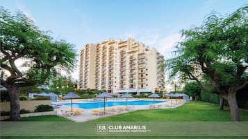 Seasonal outdoor pool, open 9 AM to 7 PM, sun loungers