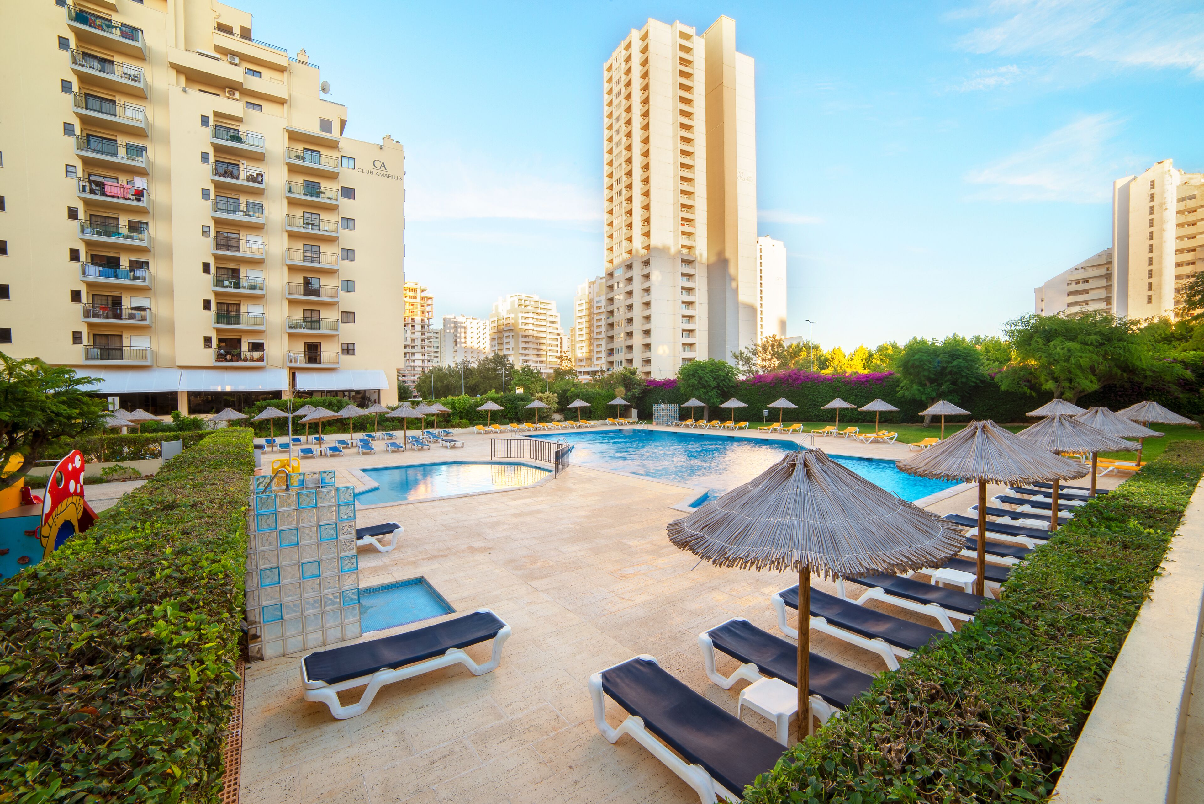 Seasonal outdoor pool, open 9 AM to 7 PM, sun loungers