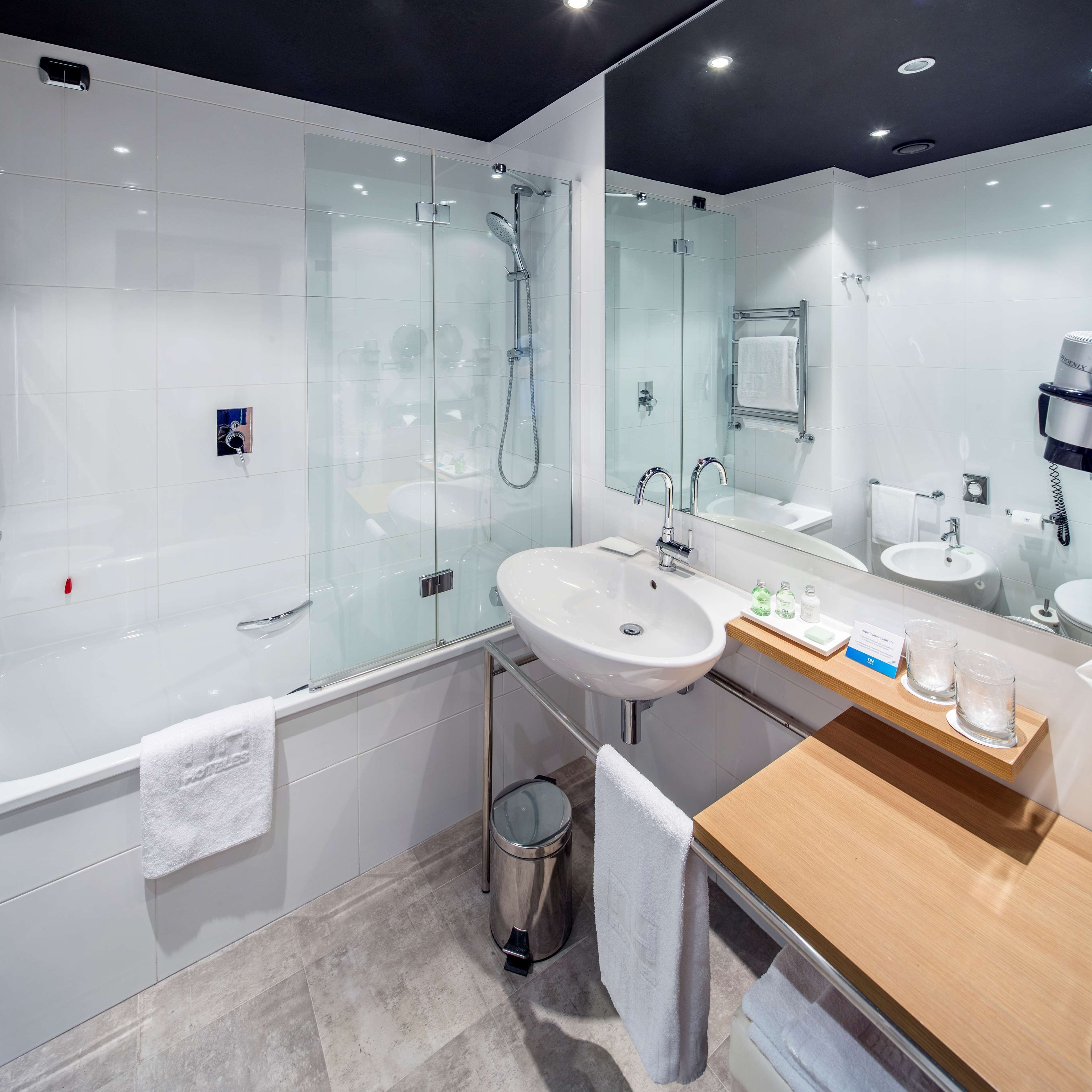 eco-friendly toiletries, hair dryer, bidet, towels