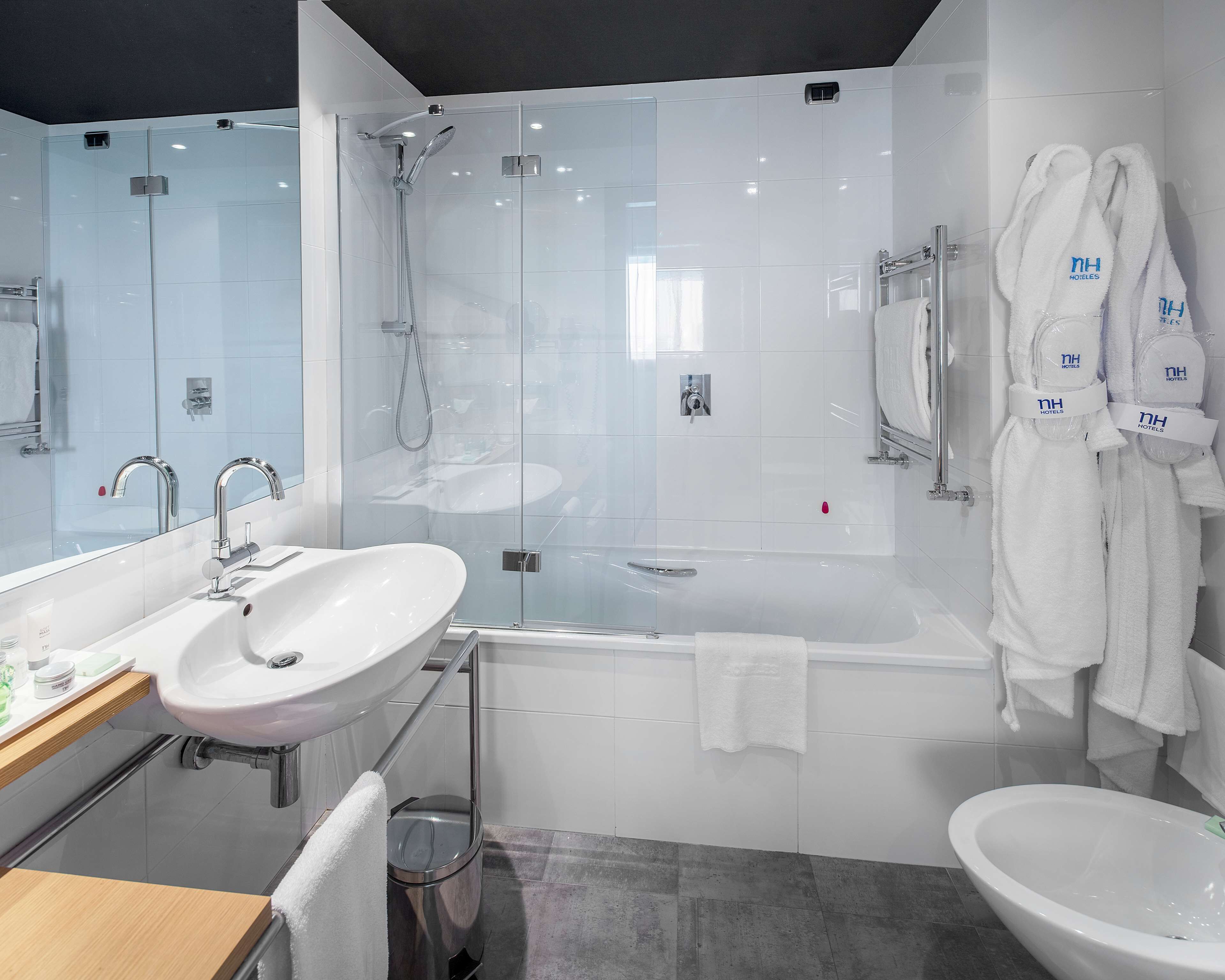 eco-friendly toiletries, hair dryer, bidet, towels