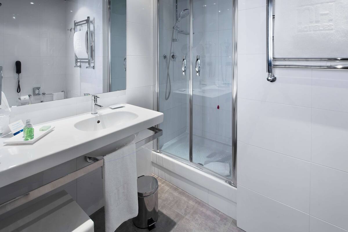 eco-friendly toiletries, hair dryer, bidet, towels