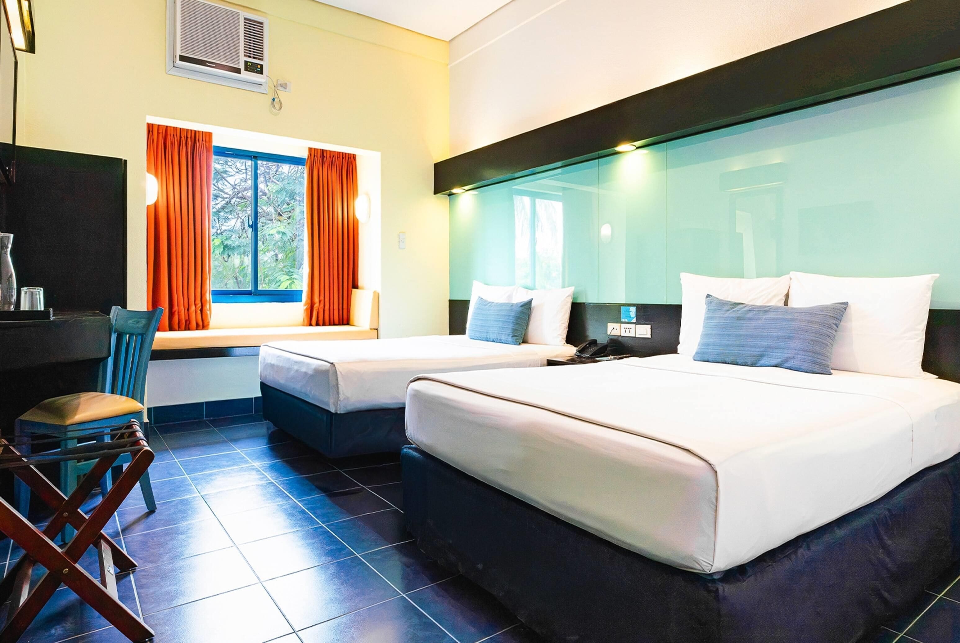 Room, 2 Queen Beds, Non Smoking, Garden View | Desk, cribs (free), WiFi (free), bed sheets