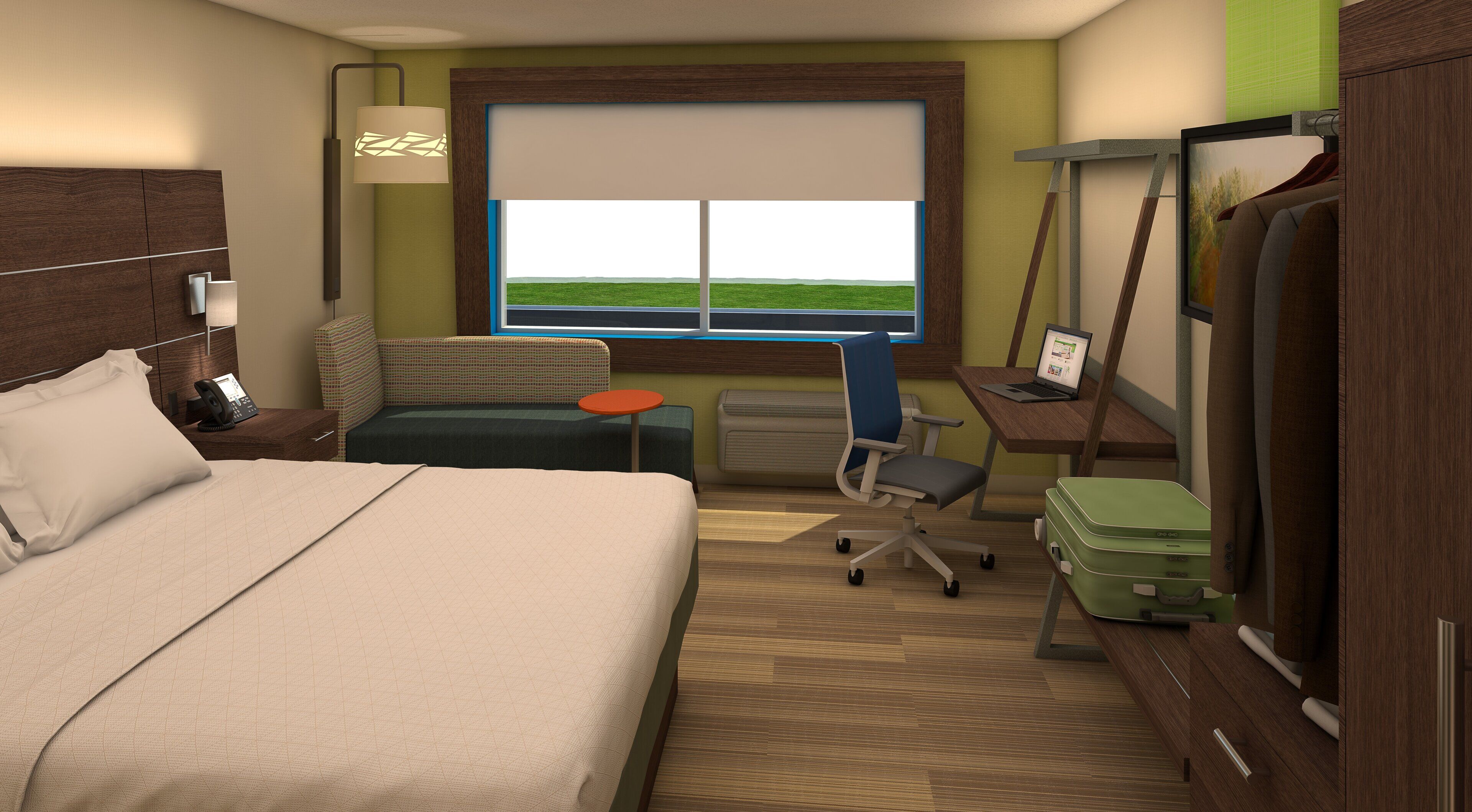 Habitación de hotel con cama, escritorio, silla, mesita, ventana con vistas y armario.