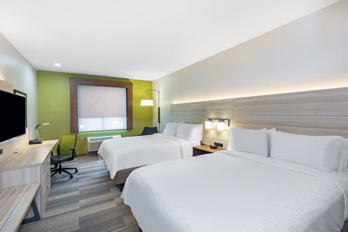 Premium bedding, down comforters, pillowtop beds, in-room safe