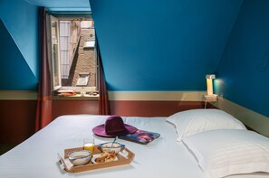 Luxe beddengoed, een kluis op de kamer, geluiddichte muren