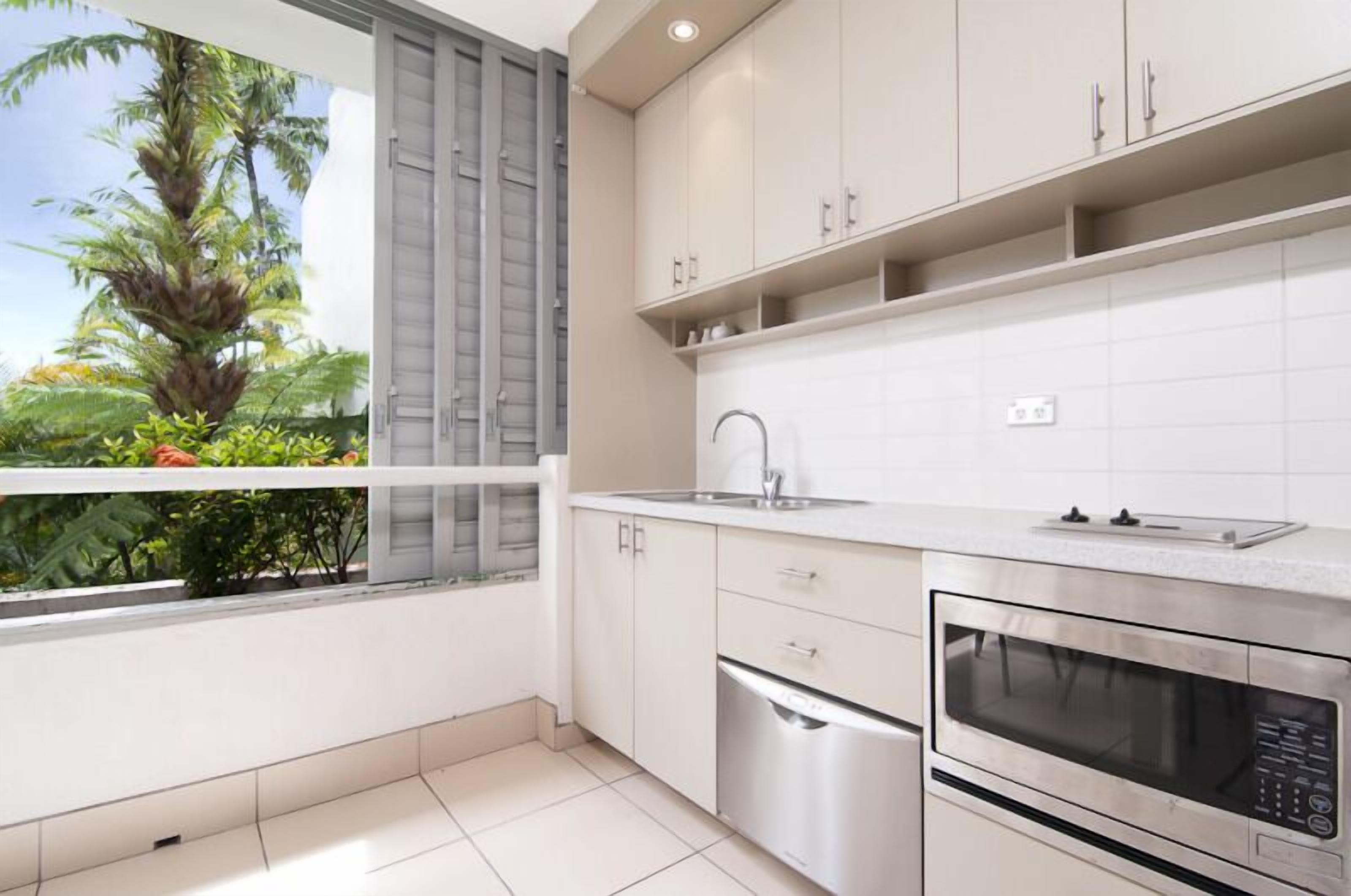 club family apartment | private kitchen | fridge, microwave, stovetop, coffee/tea maker