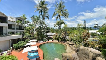 Outdoor pool, open 7:00 AM to 9:00 PM, pool umbrellas, pool loungers
