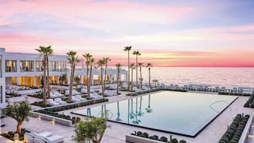 Seasonal outdoor pool, pool umbrellas, pool loungers