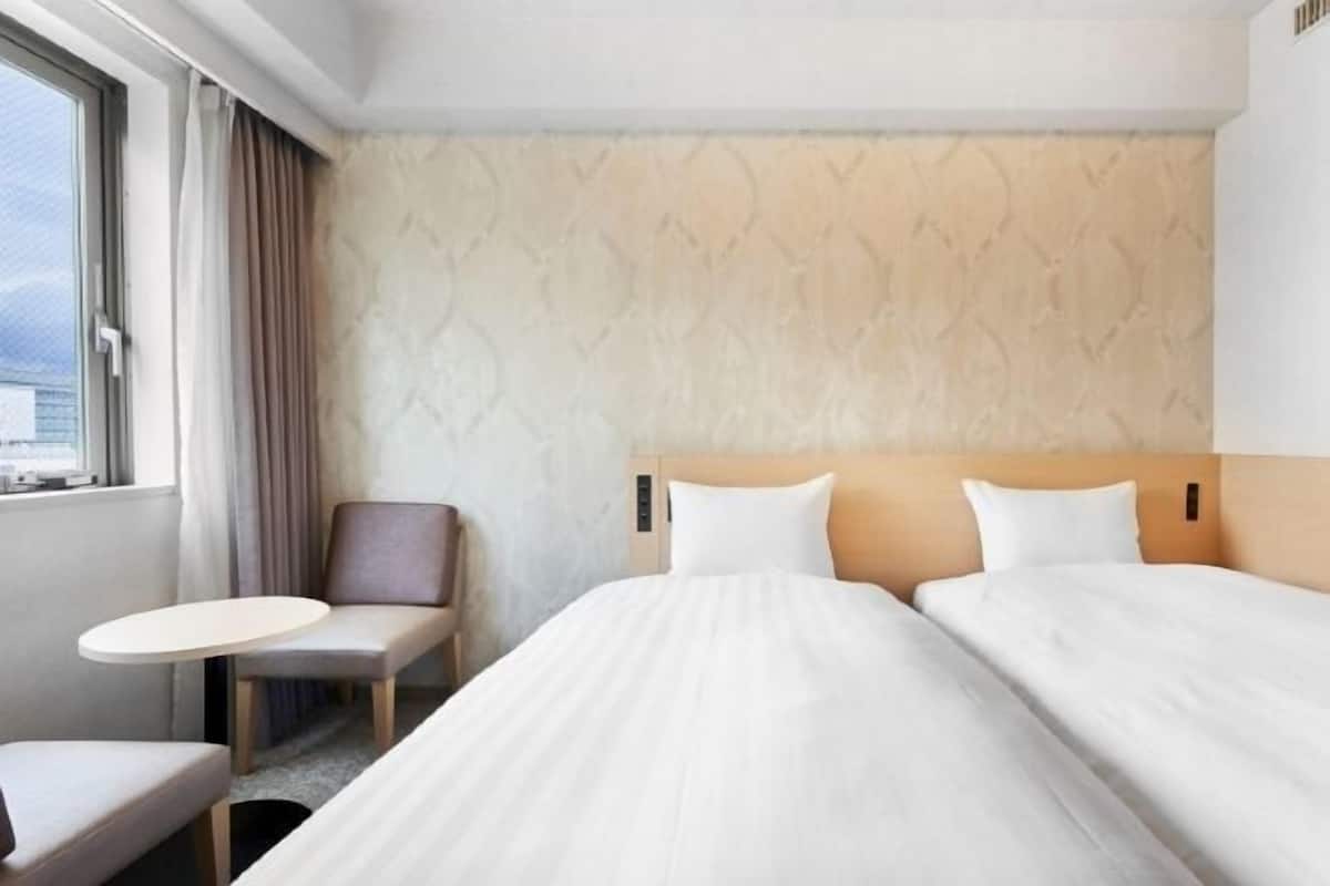 Desk, blackout curtains, free WiFi, bed sheets