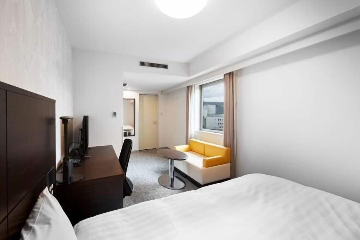 Desk, blackout curtains, free WiFi, bed sheets