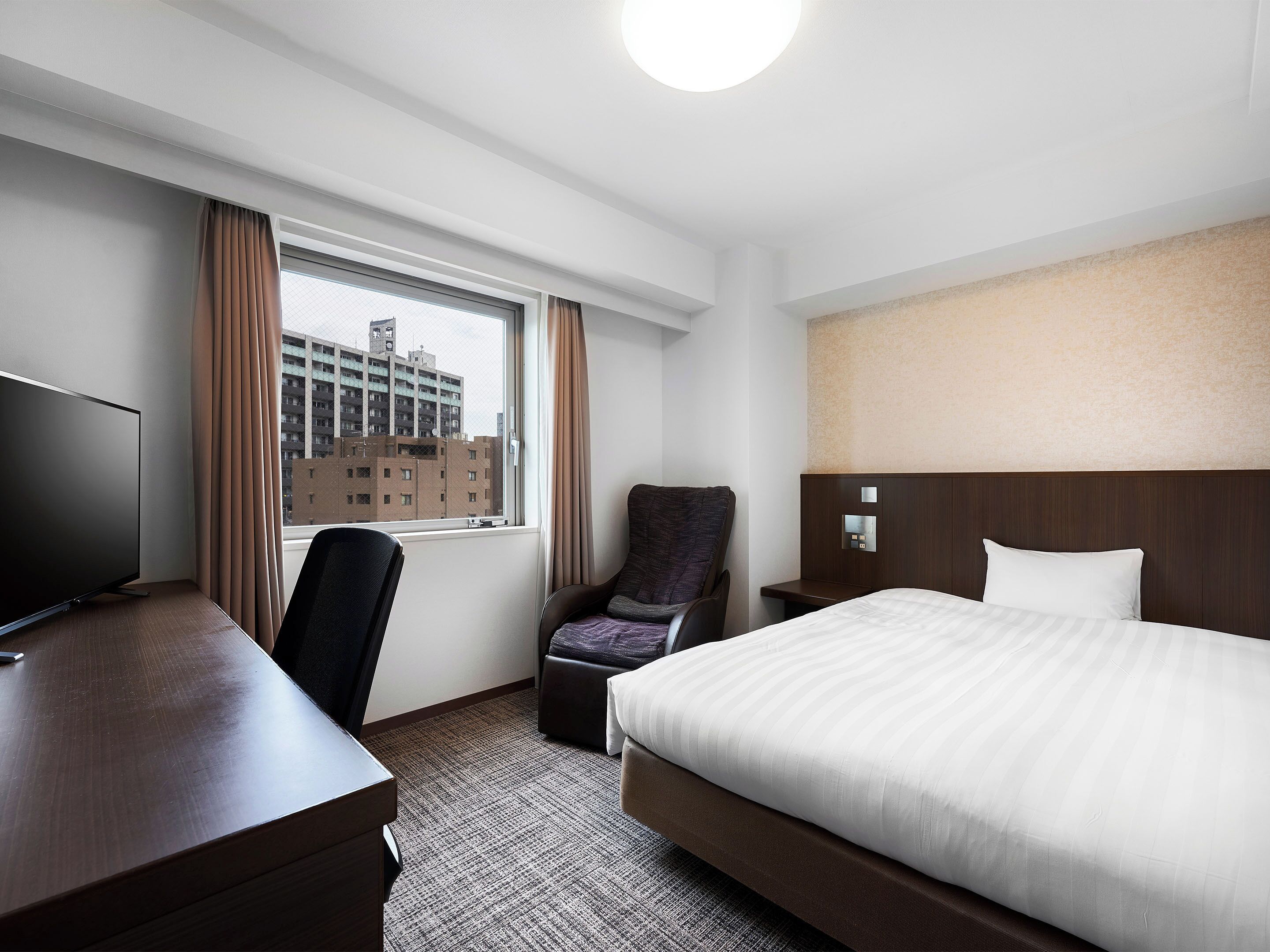 desk, blackout curtains, free wifi, bed sheets