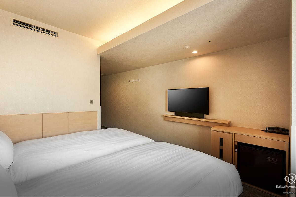Desk, blackout drapes, WiFi (free), bed sheets