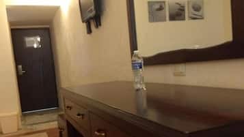 Desk, blackout curtains, bed sheets