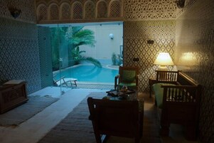 Outdoor pool, pool umbrellas, sun loungers