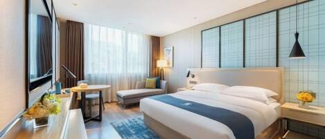 Minibar, coffres-forts dans les chambres, fer et planche Ă repasser