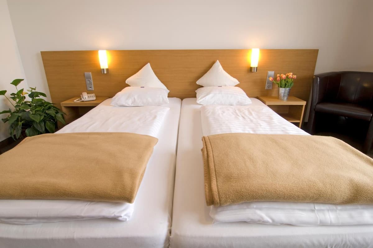 Premium bedding, in-room safe, desk, cots/infant beds