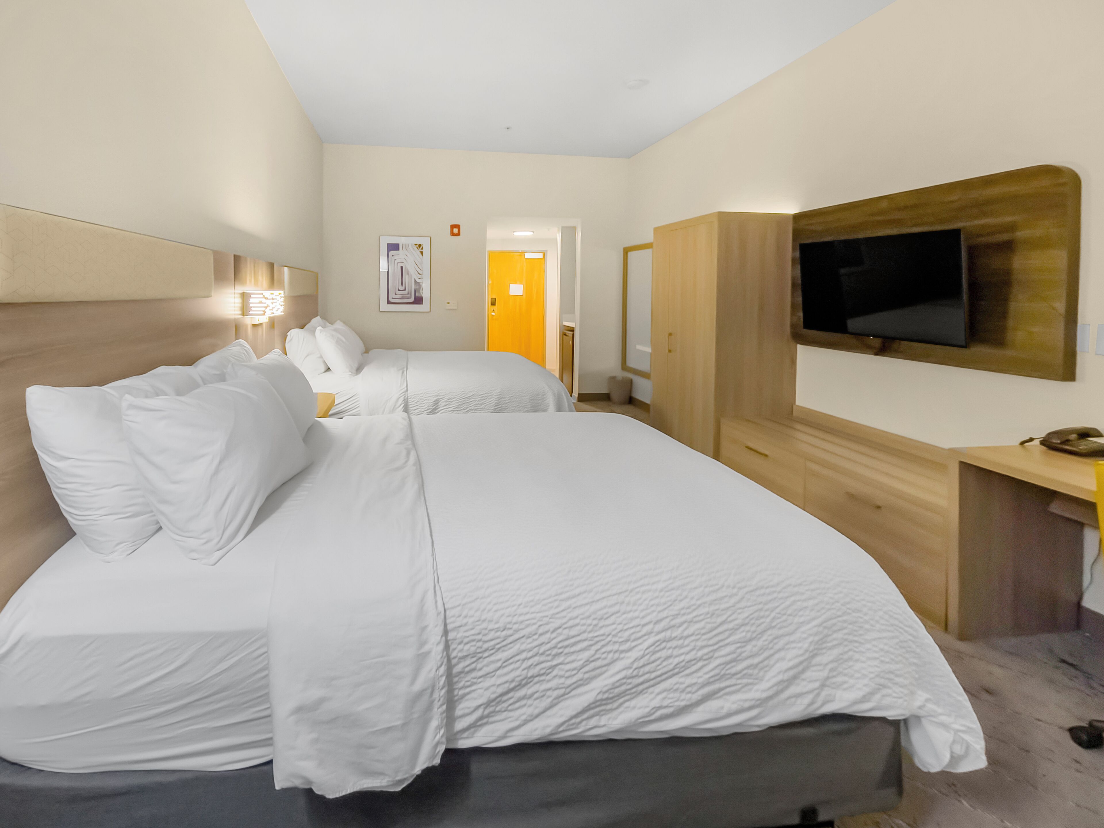 standard room, 2 queen beds, roll-in shower, non smoking (communications, roll-in shower) | in-room safe, desk, iron/ironing board, free cots/infant beds